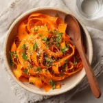 finished carrot ribbon salad in ceramic bowl for recipe card